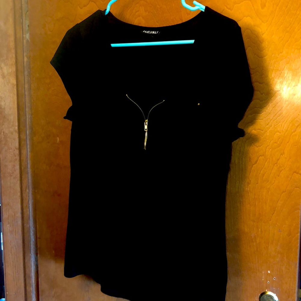 Women’s black dressy top with gold zipper